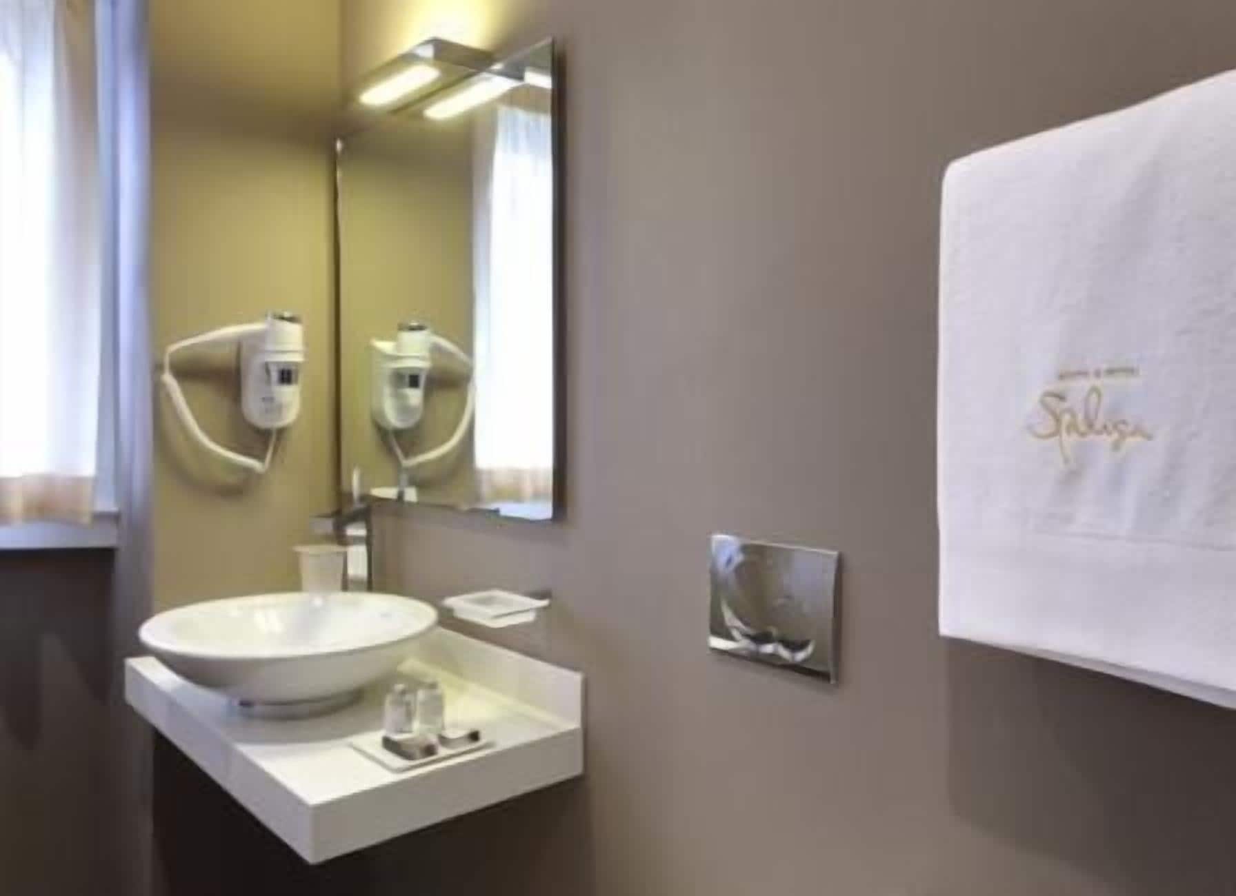 shower, rainfall showerhead, designer toiletries, hair dryer