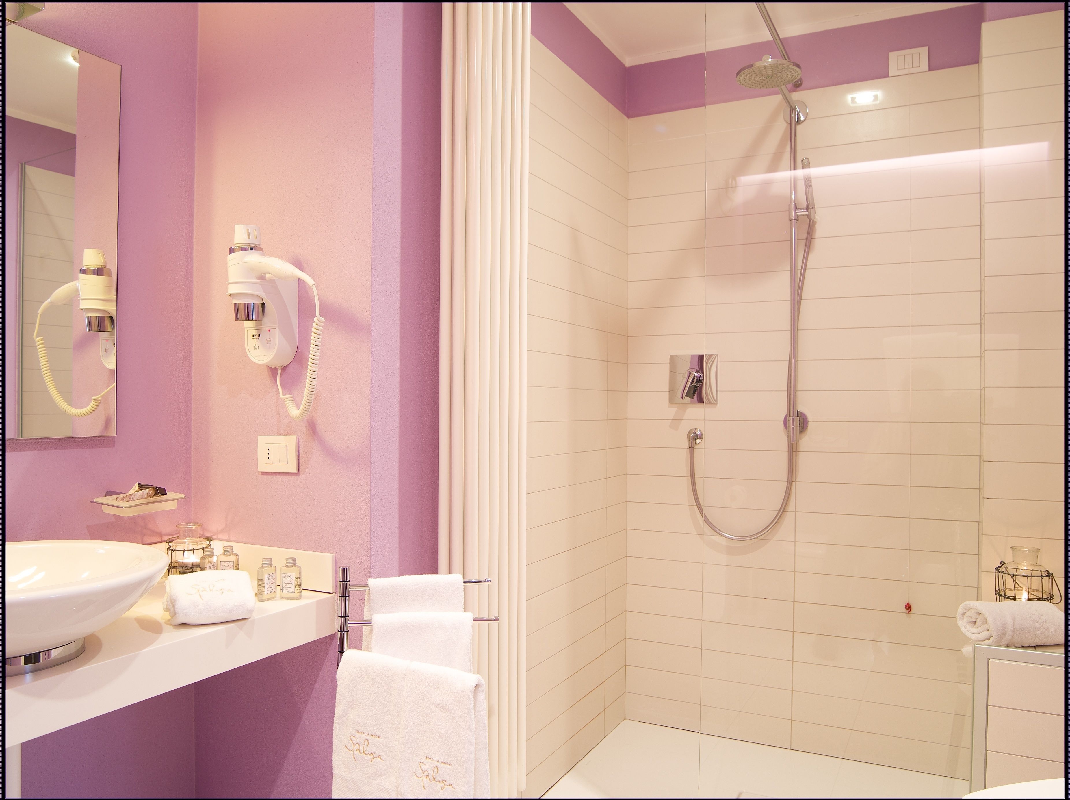 shower, rainfall showerhead, designer toiletries, hair dryer