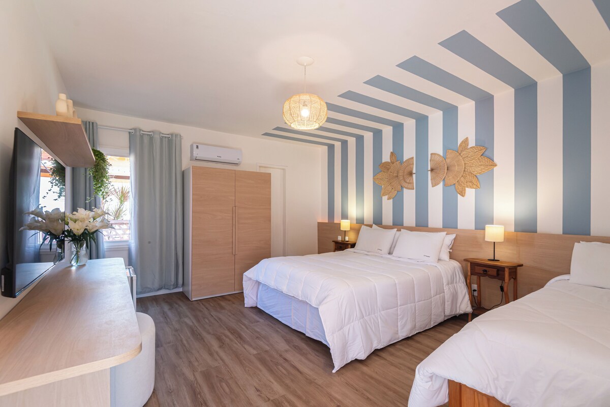 Premium Suite | Minibar, in-room safe, desk, blackout curtains