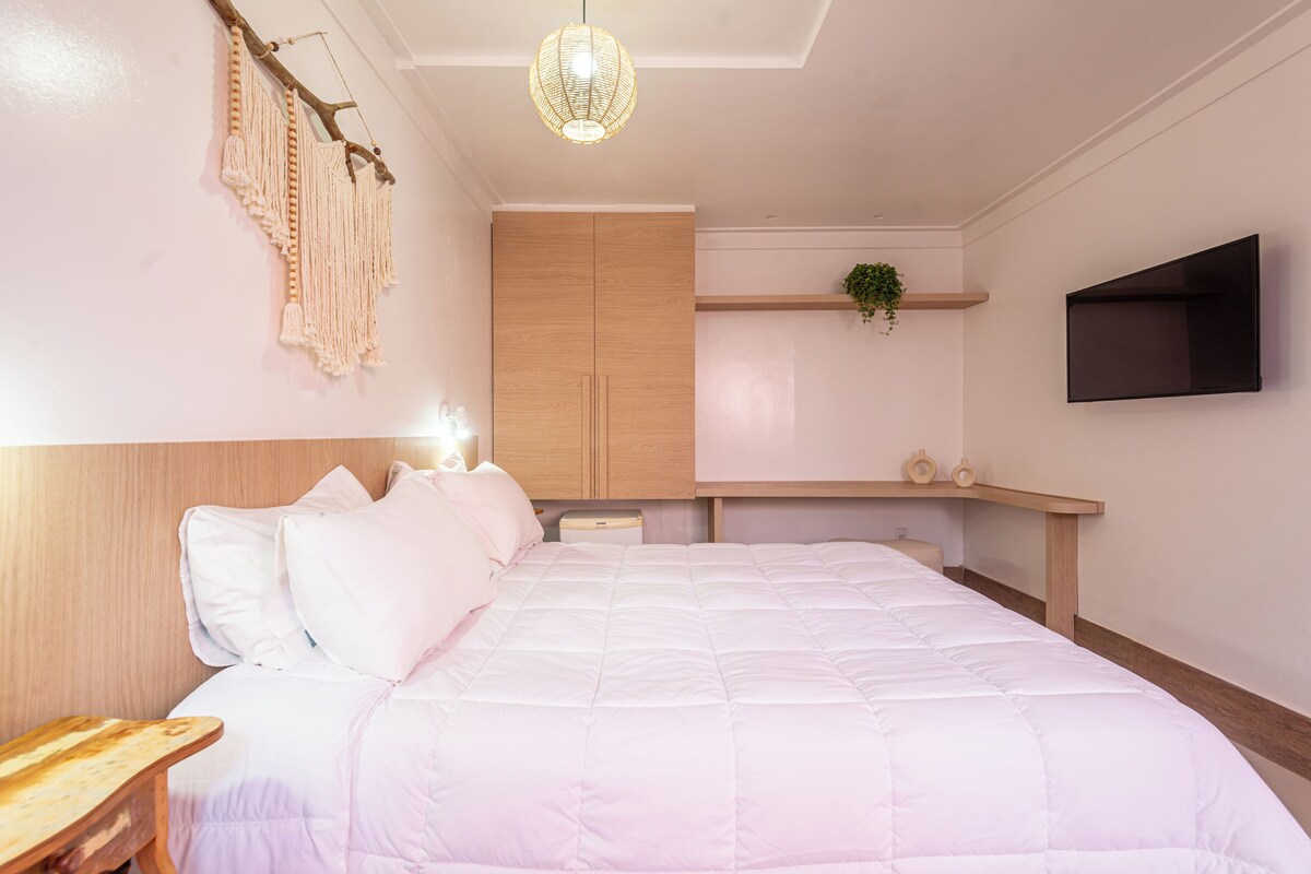 Standard Double Room | Minibar, in-room safe, desk, blackout drapes