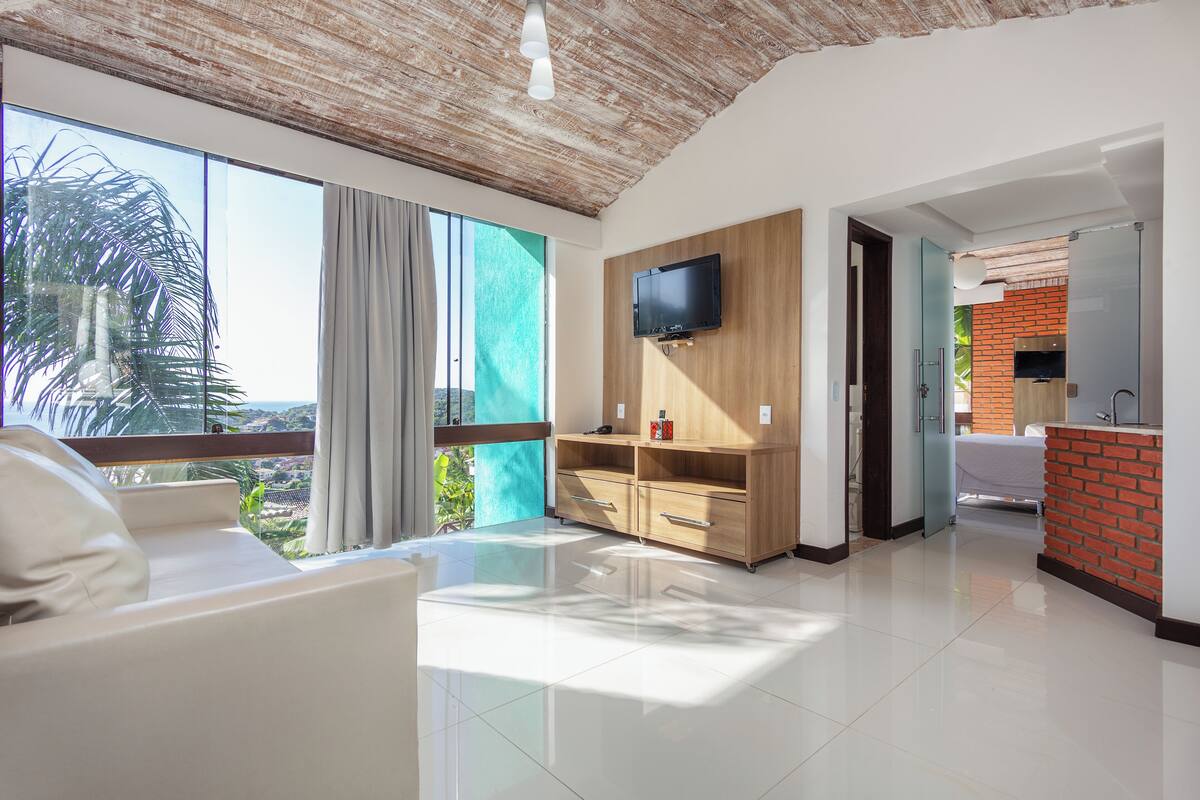 suíte junior família | living area | lcd tv