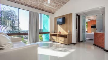 Suíte Junior Família | Living area | LCD TV
