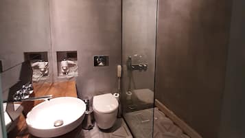 Basic Suite, 1 Bedroom | Bathroom | Shower, designer toiletries, hair dryer, slippers