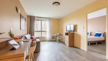 Apartment, 1 Bedroom | Living area | LCD TV