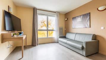 Apartment, 2 Bedrooms | Living area | LCD TV
