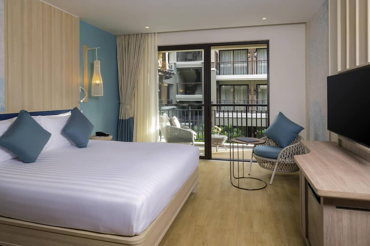 Deluxe Double Room, 1 Double Bed, Pool View (Beach Wing) | In-room safe, desk, blackout drapes, iron/ironing board