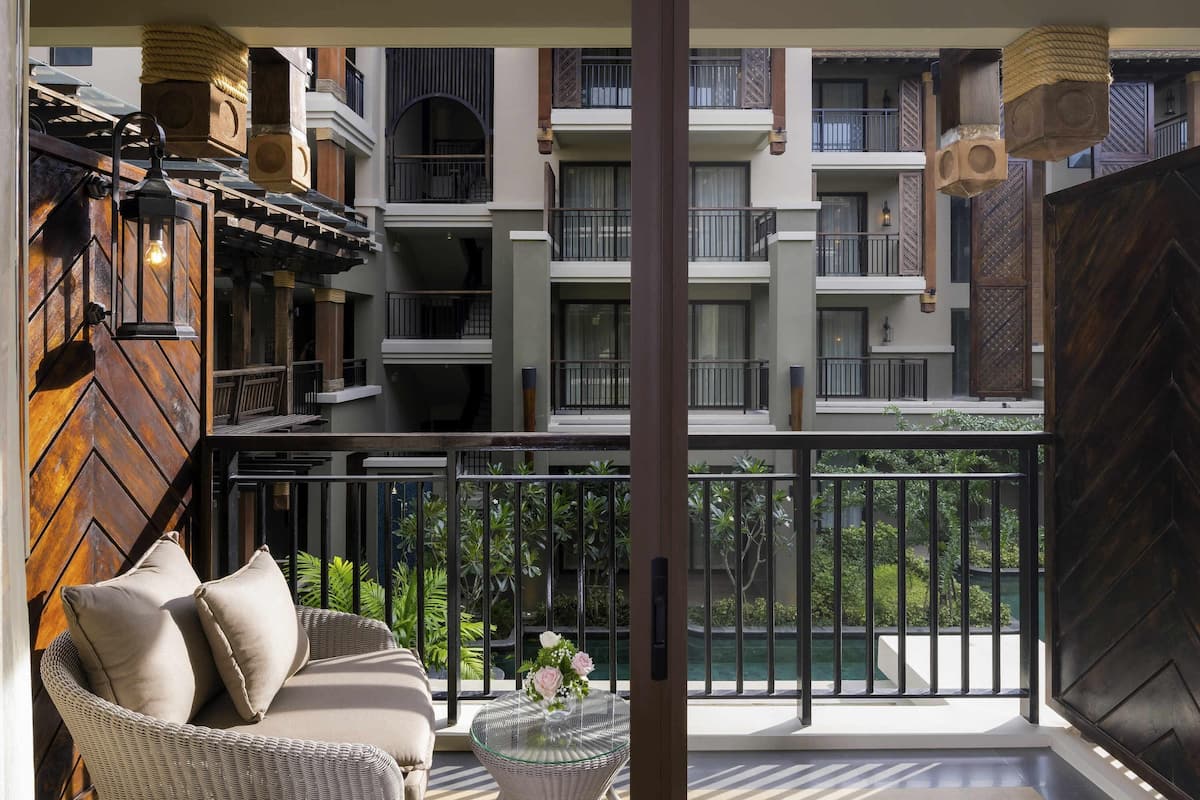 Deluxe Double Room, 1 Double Bed, Pool View (Beach Wing) | In-room safe, desk, blackout drapes, iron/ironing board