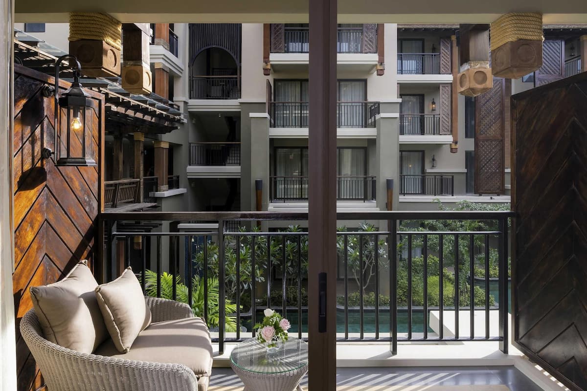 Deluxe Double Room, 1 Double Bed, Pool View (Beach Wing) | In-room safe, desk, blackout drapes, iron/ironing board