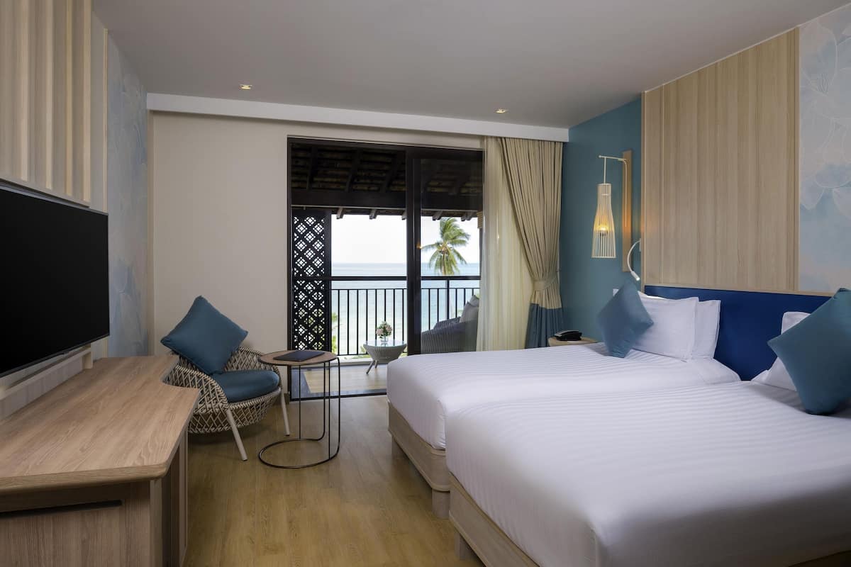 Deluxe Room, 2 Twin Beds, Sea View (Beach Wing) | In-room safe, desk, blackout drapes, iron/ironing board