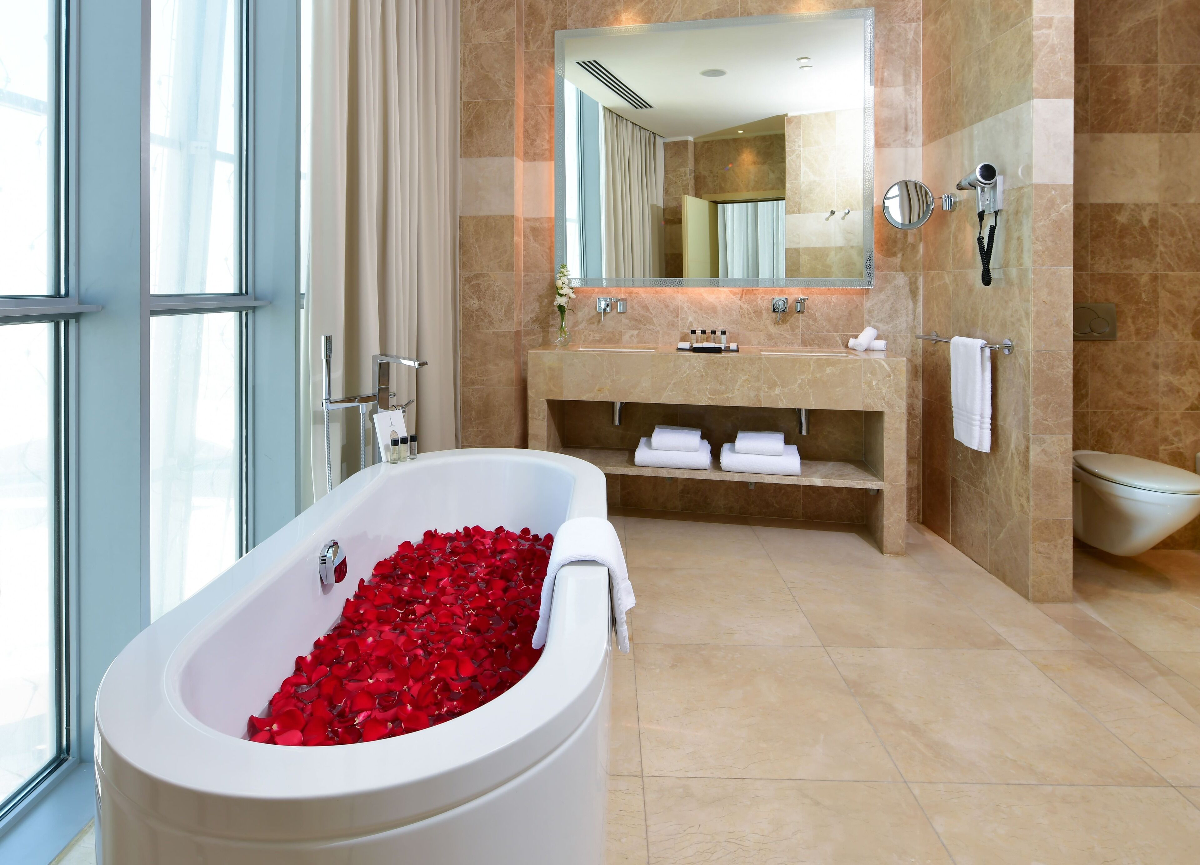 separate bathtub and shower, deep-soaking bathtub, rainfall showerhead