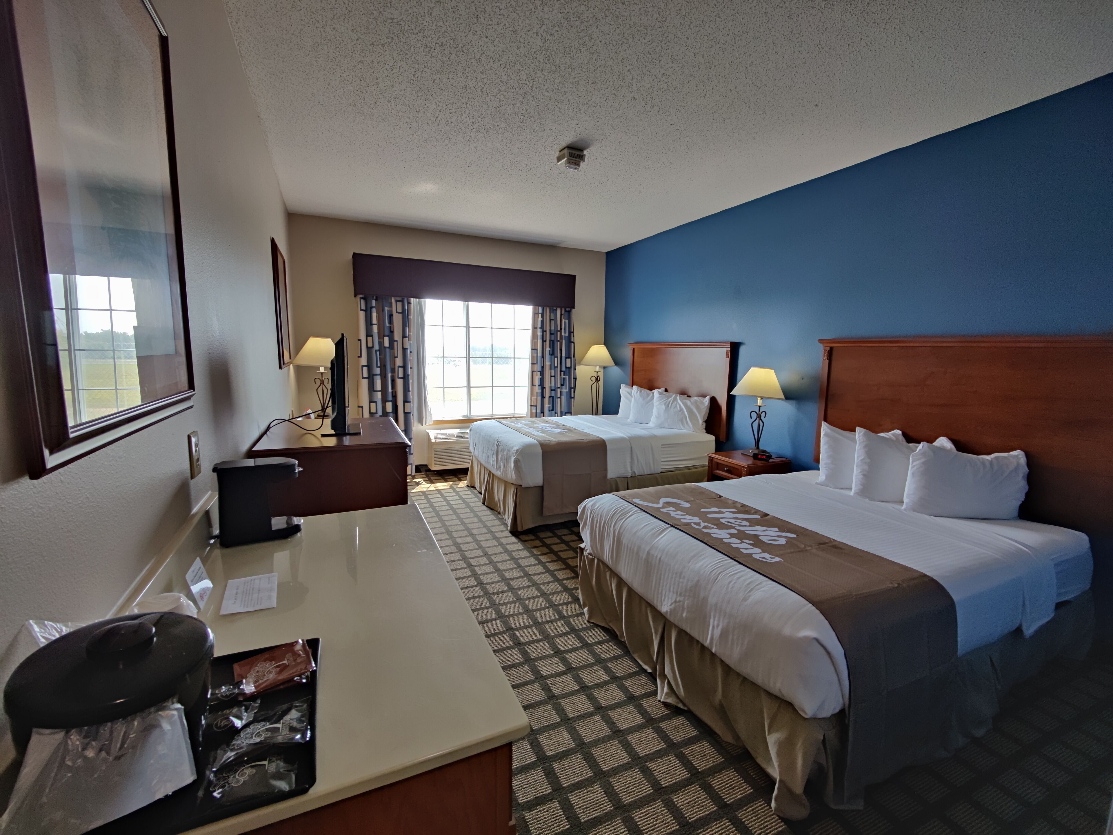 room, 2 queen beds, non smoking (mobility, roll-in shower) | in-room safe, iron/ironing board, free cots/infant beds, rollaway beds