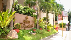 A hotel sign with "The Elizabeth" and "HOTEL" written on it, surrounded by greenery and a "NO ENTRY" sign. - Hotel Elizabeth Cebu (Cebu City)