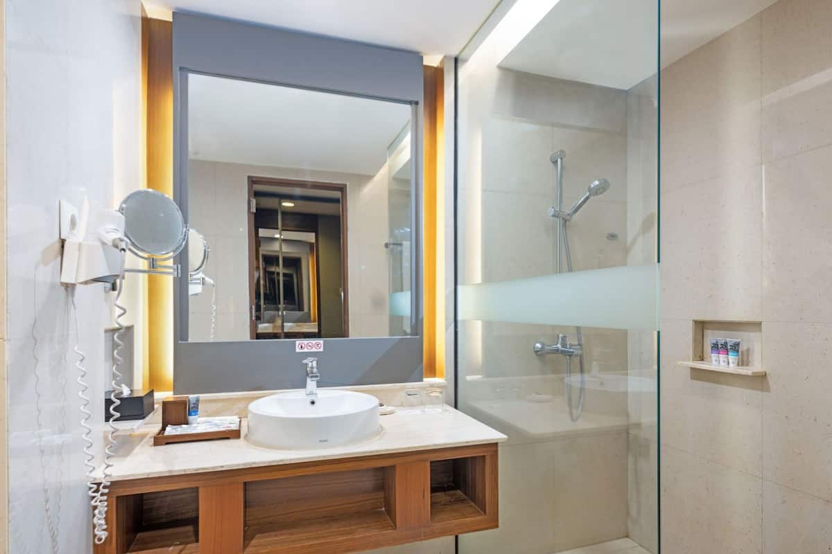 Bathroom | Shower, free toiletries, hair dryer, bathrobes