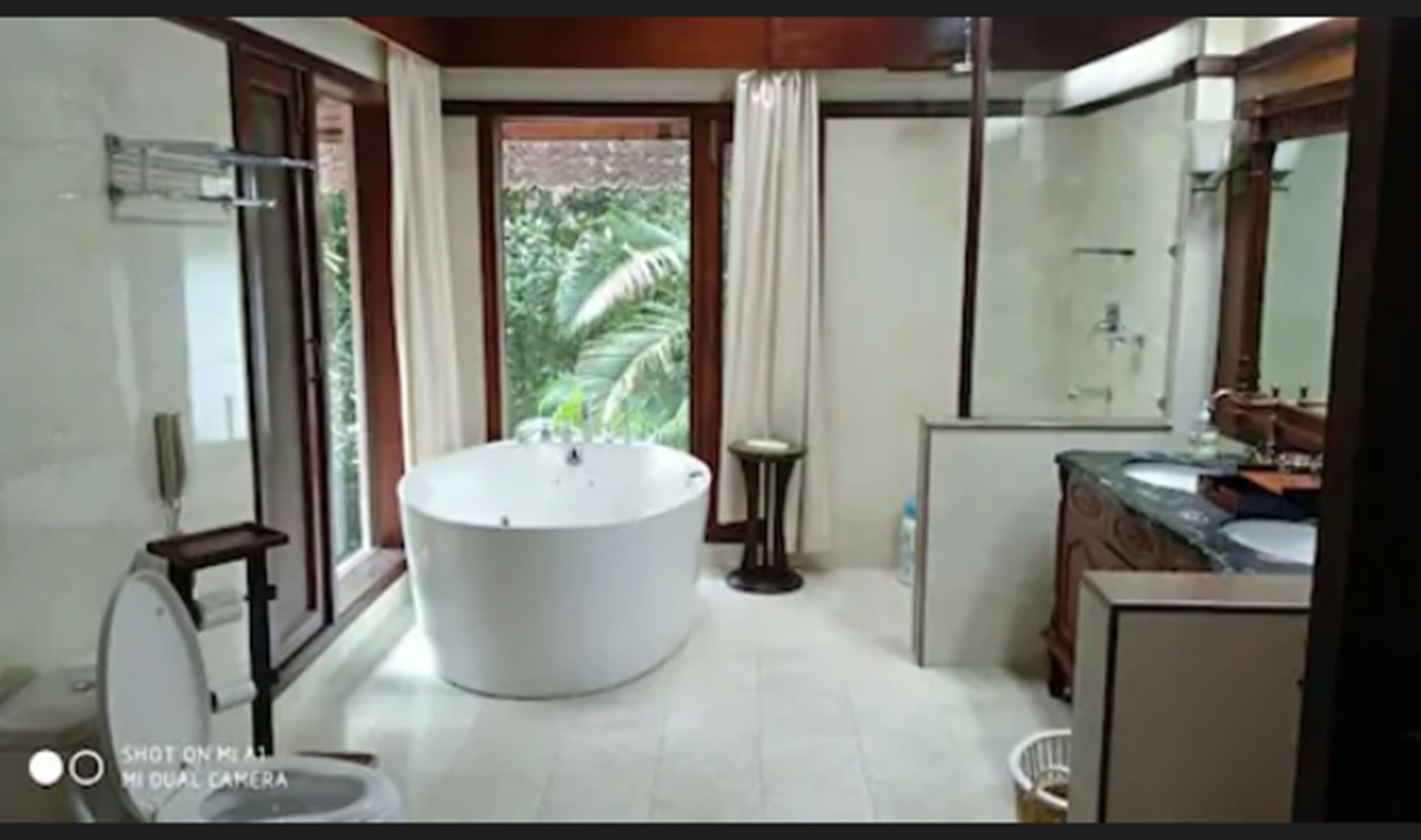 shower, hair dryer, bathrobes, slippers