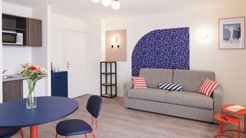 Departamento, 1 habitación | Área de sala de estar
