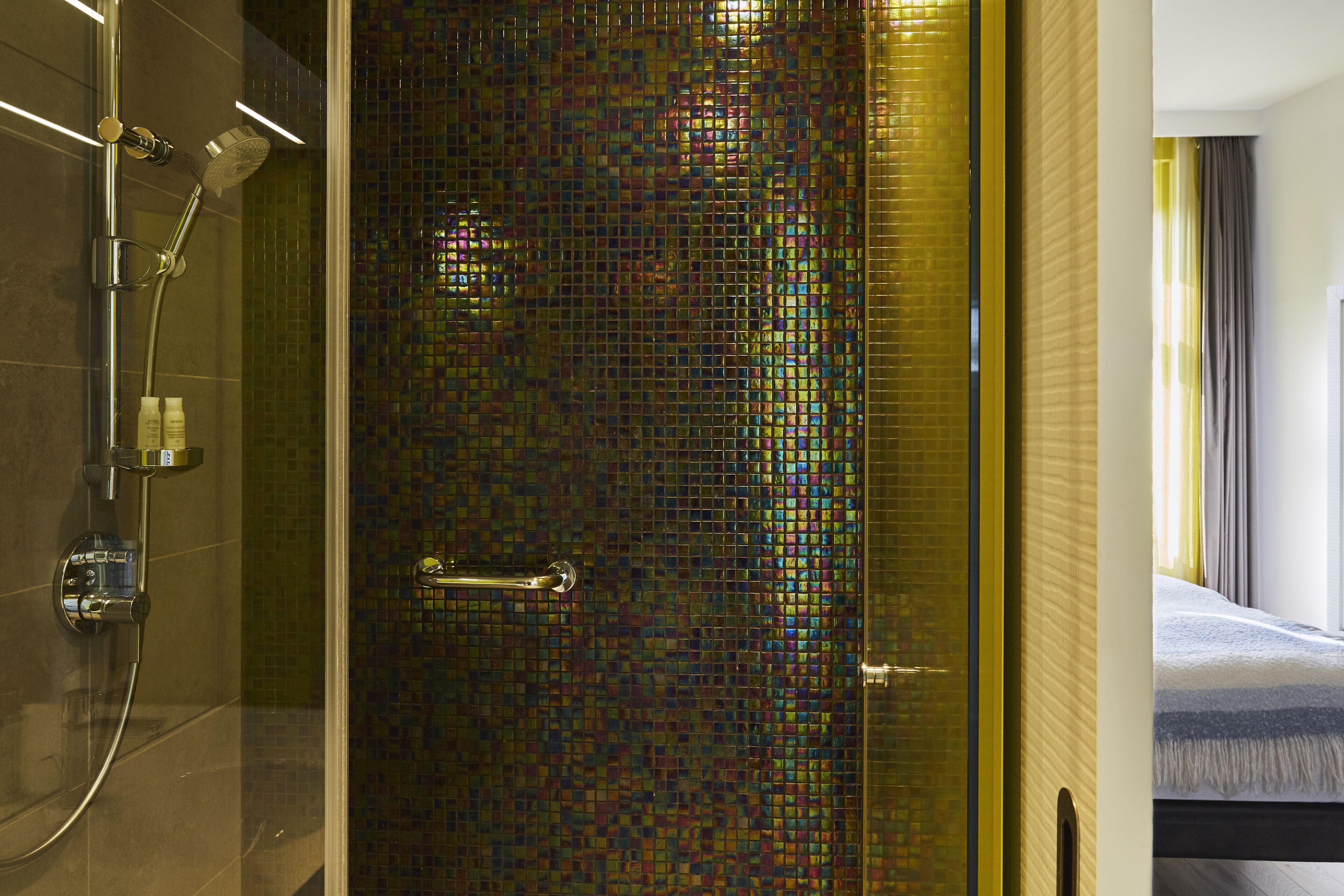 shower, rainfall showerhead, designer toiletries, hair dryer