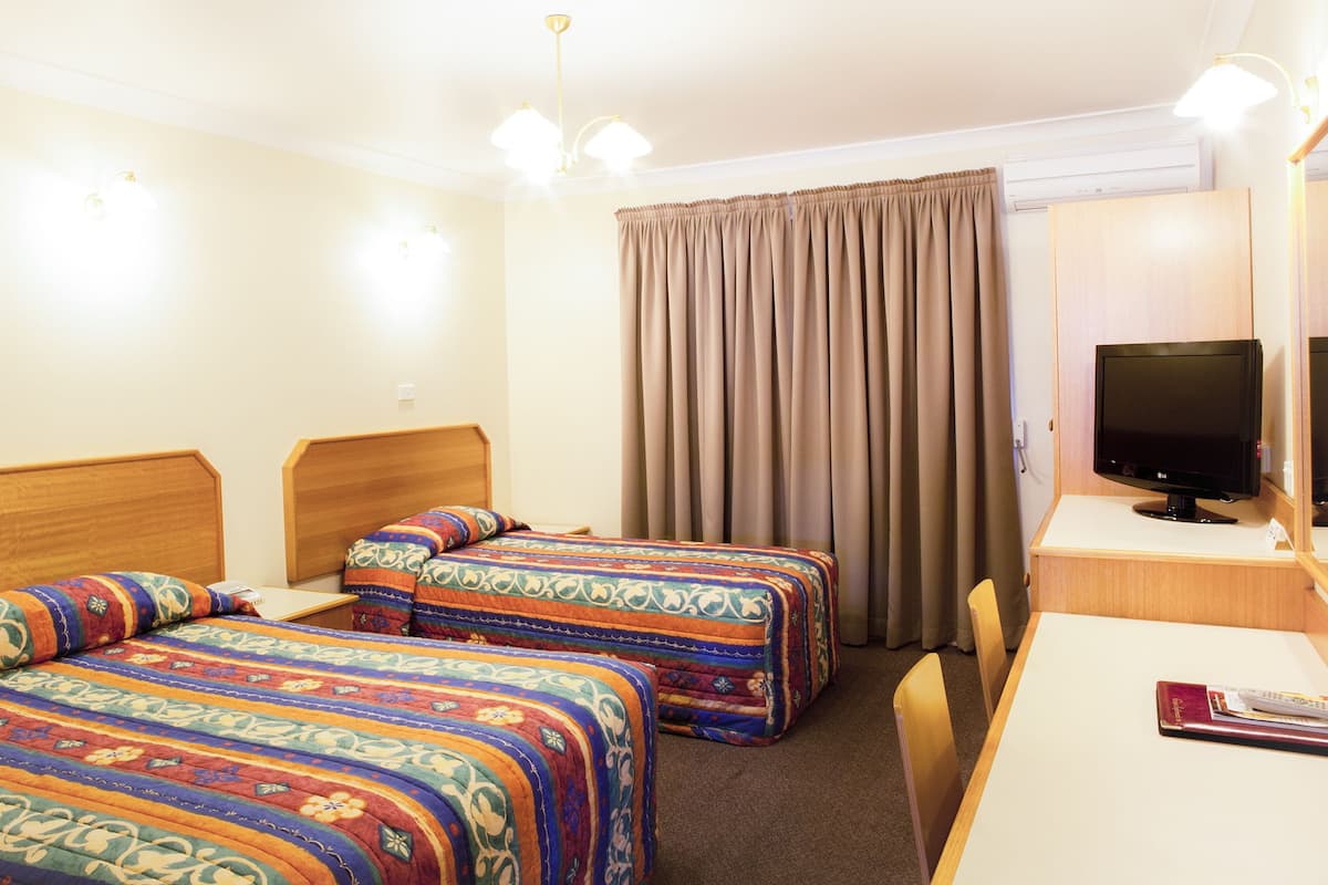 Standard Twin Room | 1 bedroom, individually decorated, individually furnished, desk