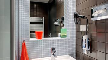 Shower, free toiletries, hair dryer, towels