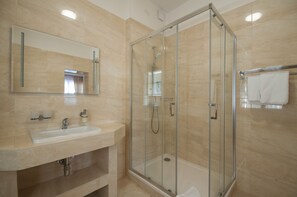 Suite, 1 Bedroom | Bathroom | Shower, free toiletries, hair dryer, towels