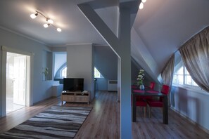 Appartement Confort, 1 grand lit et 1 canapé-lit