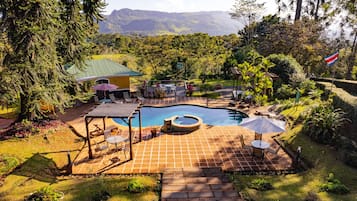 Outdoor pool, open 7 AM to 9:00 PM, pool loungers