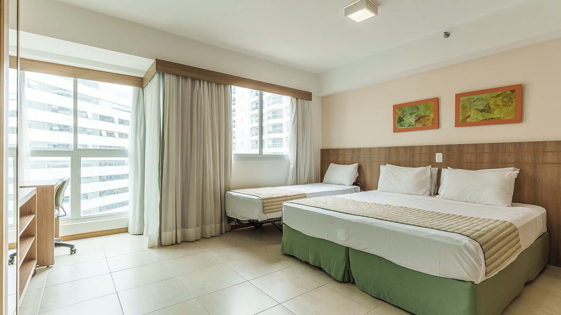 traditional triple room | 1 bedroom, in-room safe, desk, blackout curtains