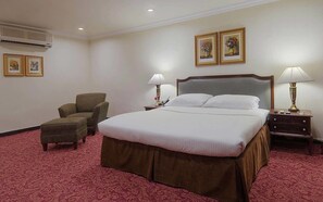 Premium bedding, free minibar items, in-room safe
