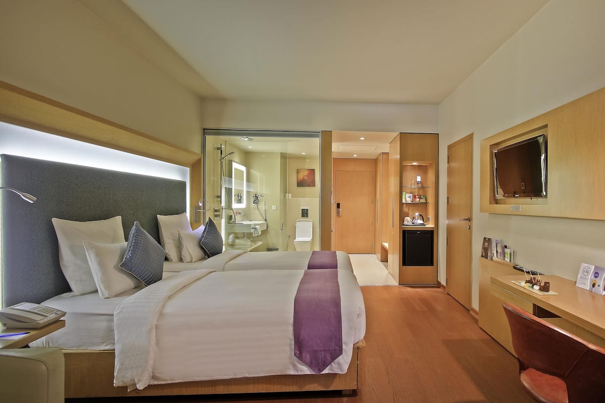 Premium bedding, down duvets, minibar, in-room safe