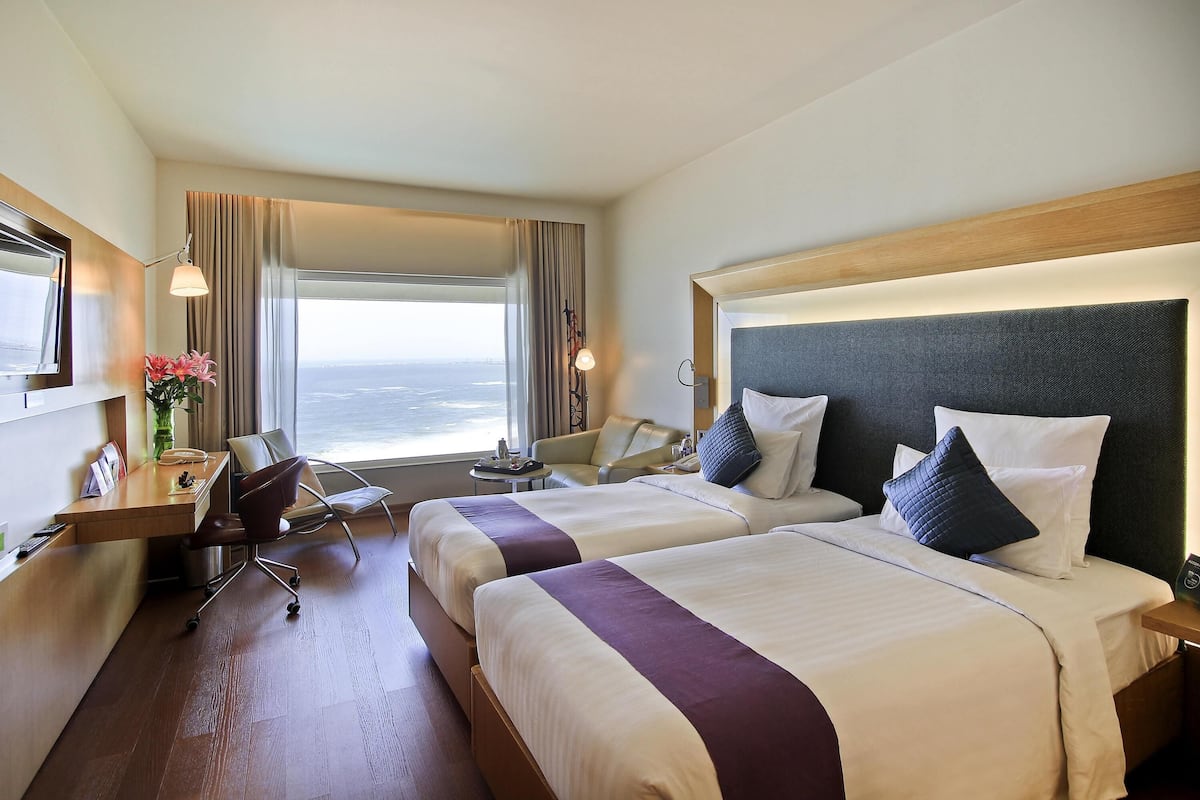 Premium bedding, down comforters, minibar, in-room safe