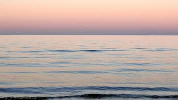 Private beach nearby, white sand, 3 beach bars