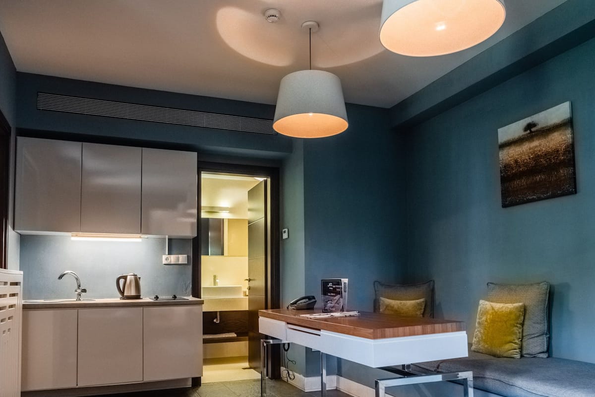 Suite familiar | 1 habitación, minibar y caja de seguridad en la habitación