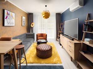 Televisión de pantalla plana 70 cm con canales de televisión por cable