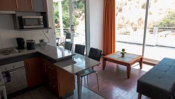 Standard Apartment | Living area | Flat-screen TV