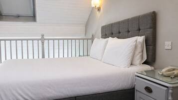 Superior Suite, 1 Bedroom, Mezzanine | Desk, iron/ironing board, free WiFi, bed sheets