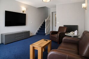 Superior suite, 1 slaapkamer, op tussenverdieping | Een bureau, een strijkplank/strijkijzer, gratis wifi, beddengoed