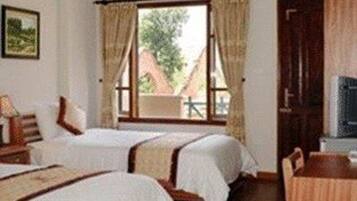 Deluxe Triple Room | Premium bedding, minibar, in-room safe, individually decorated