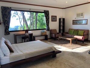 Chambre Signature, 1 grand lit et 1 canapé-lit, vue océan | Vue sur la plage/l’océan