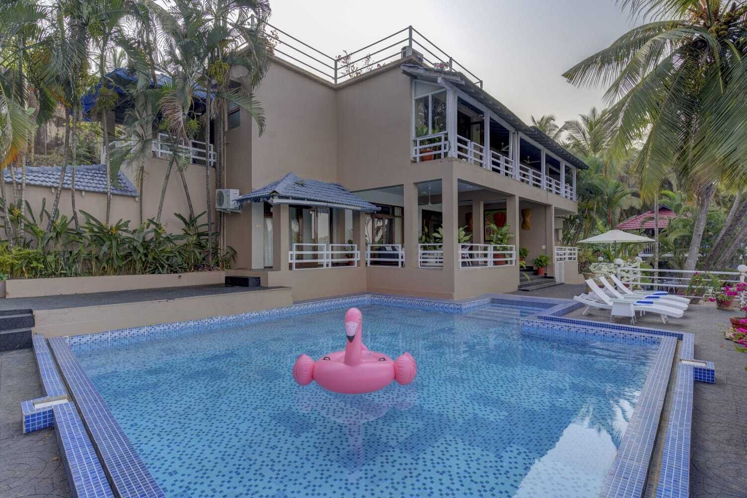 2 indoor pools, 2 outdoor pools, open 8:00 AM to 8:00 PM, pool umbrellas