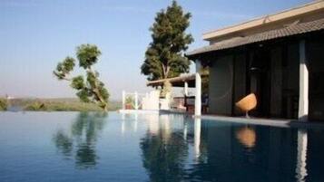 2 outdoor pools, pool umbrellas, sun loungers