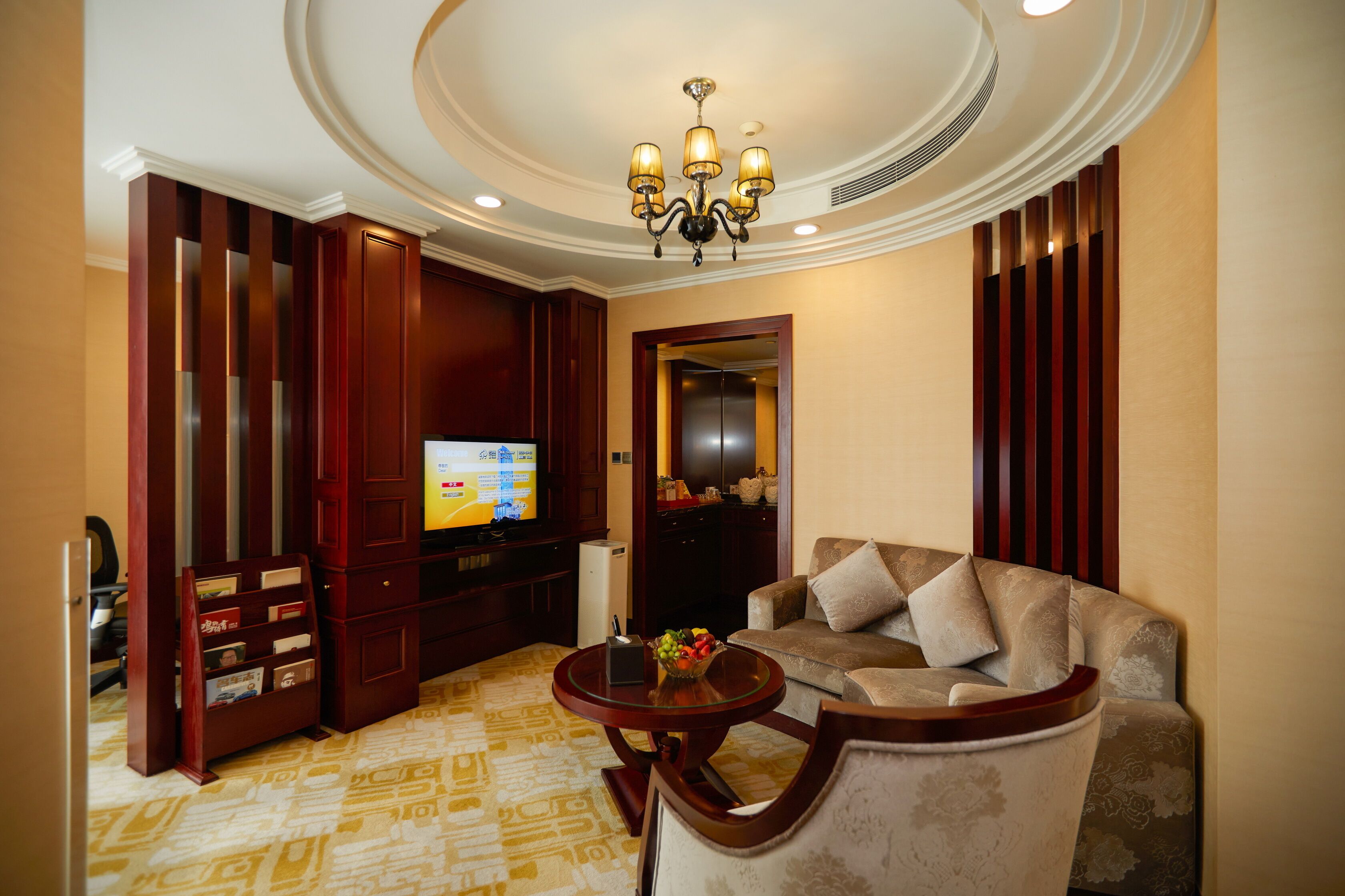 deluxe suite (facebook, twitter available inroom) | living area | lcd tv, ipod dock, pay films