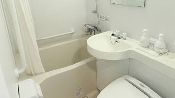Combined shower/tub, free toiletries, hair dryer, slippers