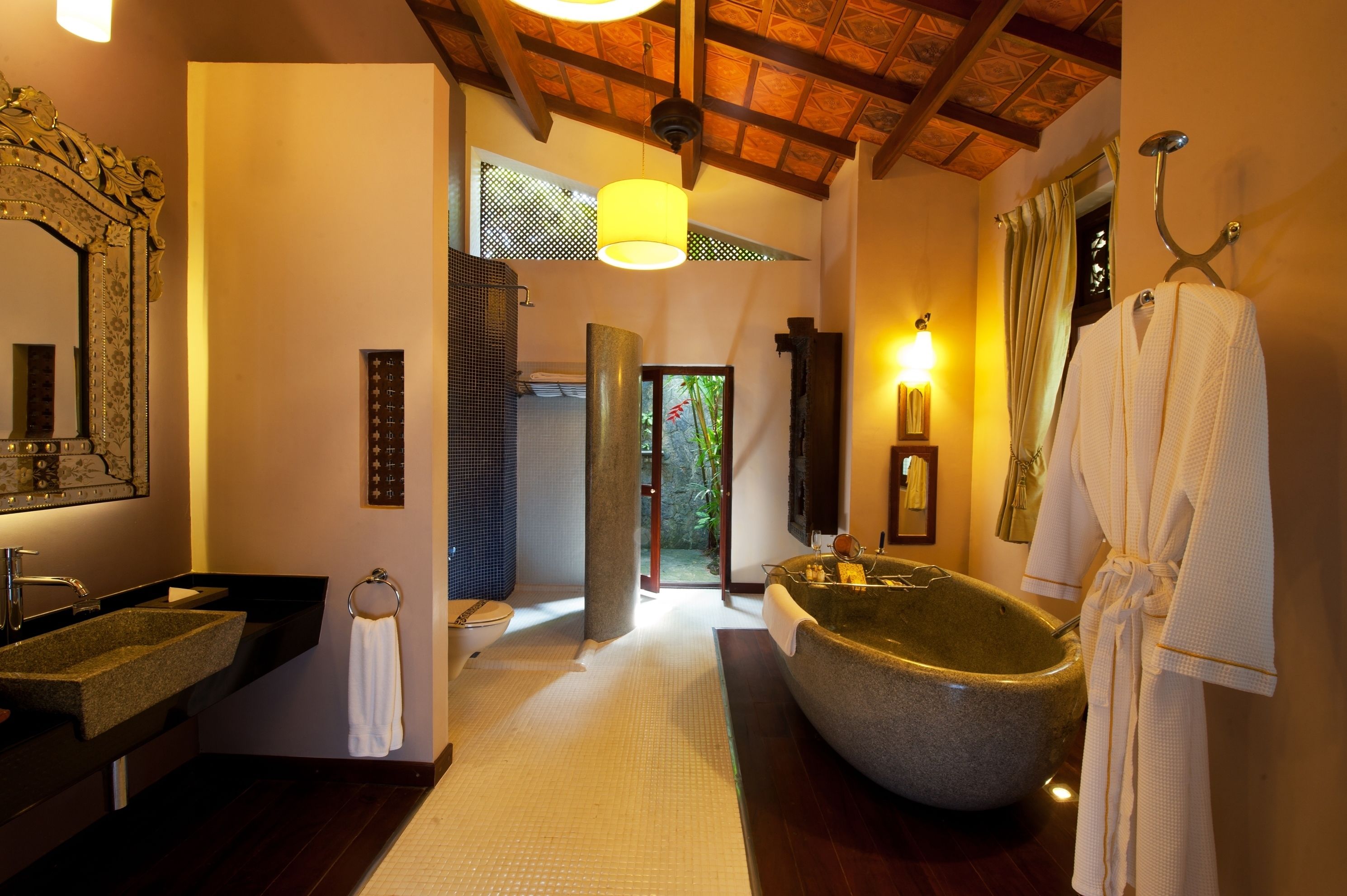 Separate bathtub and shower, deep-soaking bathtub, designer toiletries