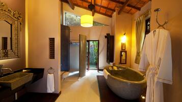 Separate bathtub and shower, deep-soaking bathtub, designer toiletries