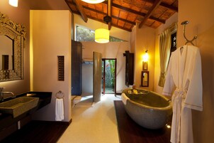 Separate tub and shower, deep soaking tub, designer toiletries