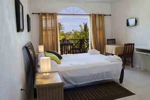 Estudio, 1 cama Queen size, cocineta, vista al jardín | Vista al jardín