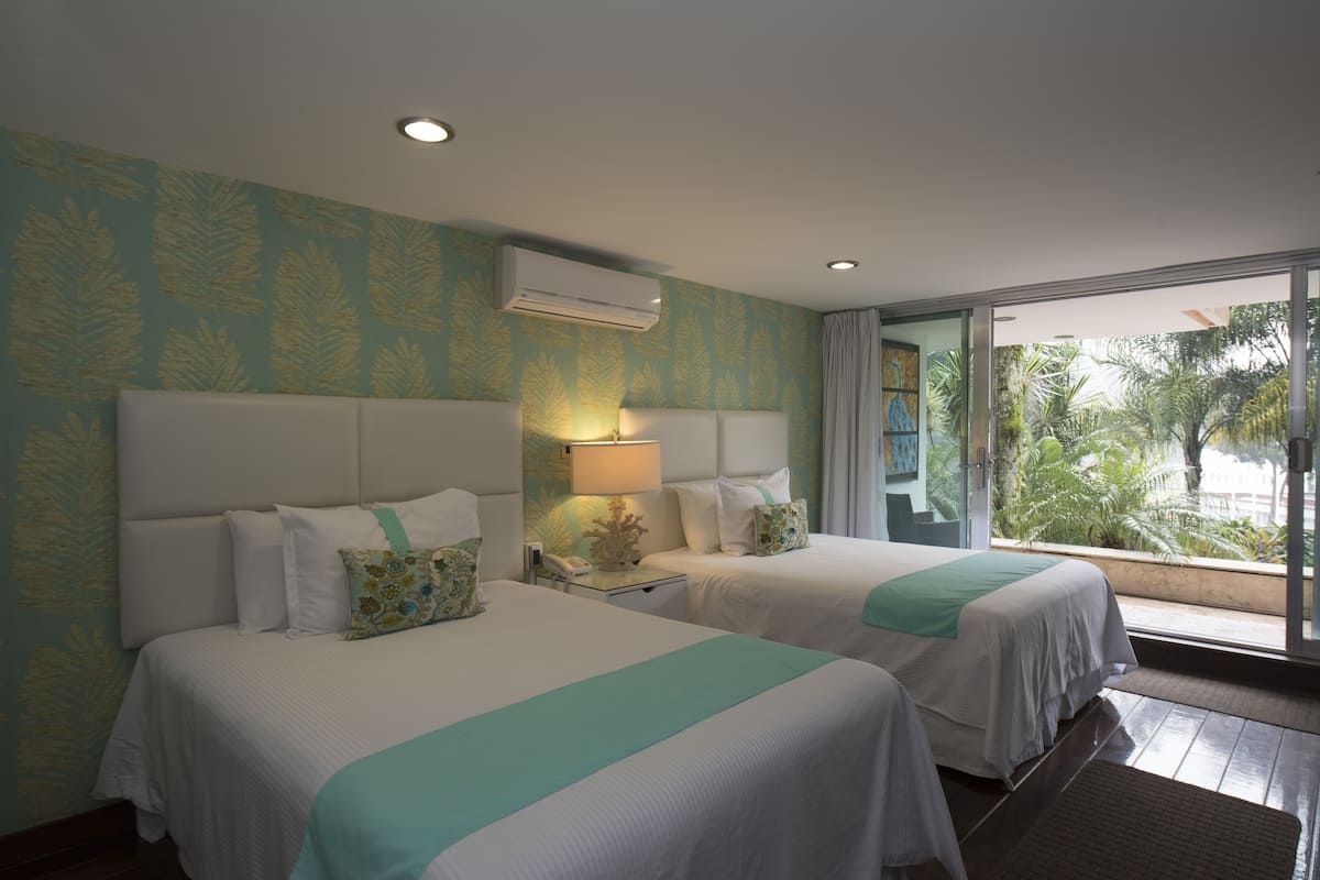 Junior Suite Pool View | 1 bedroom, premium bedding, down comforters, pillowtop beds