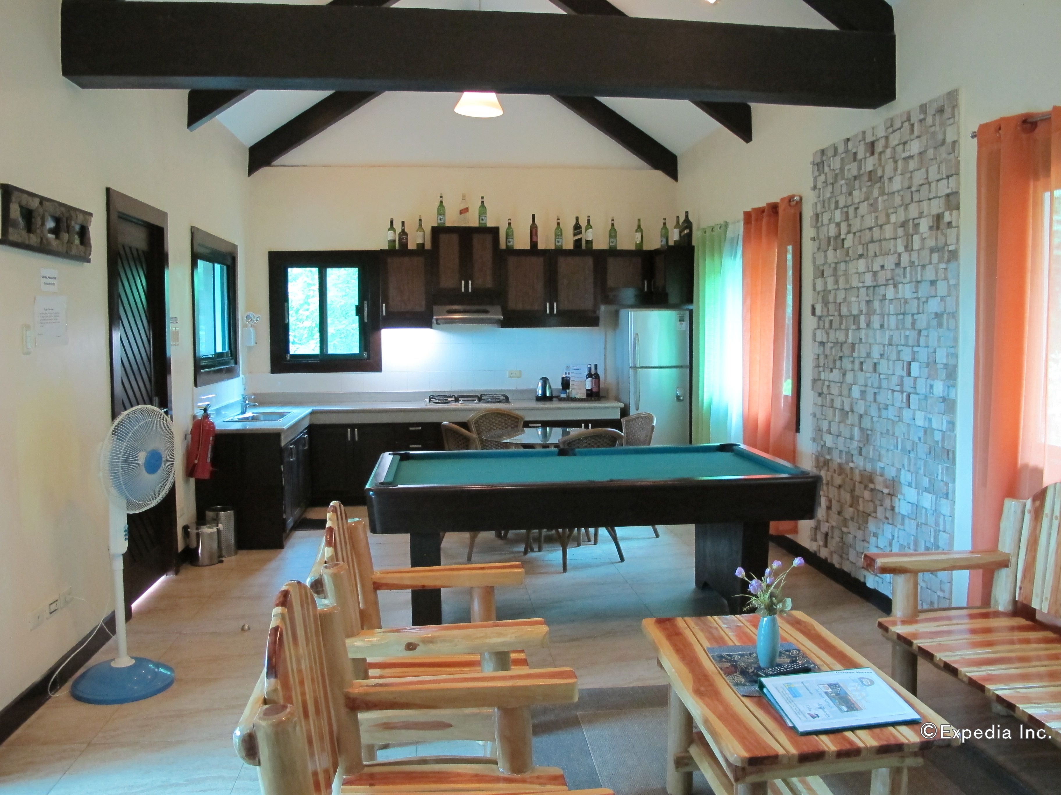 ocean garden house | living area | flat-screen tv