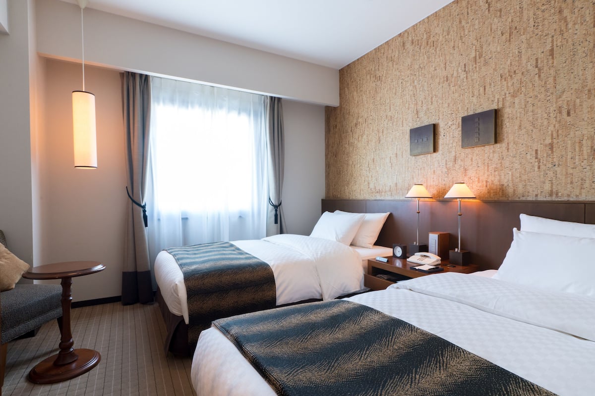 standard twin room (2 semi double beds) | down duvets, desk, blackout curtains, iron/ironing board