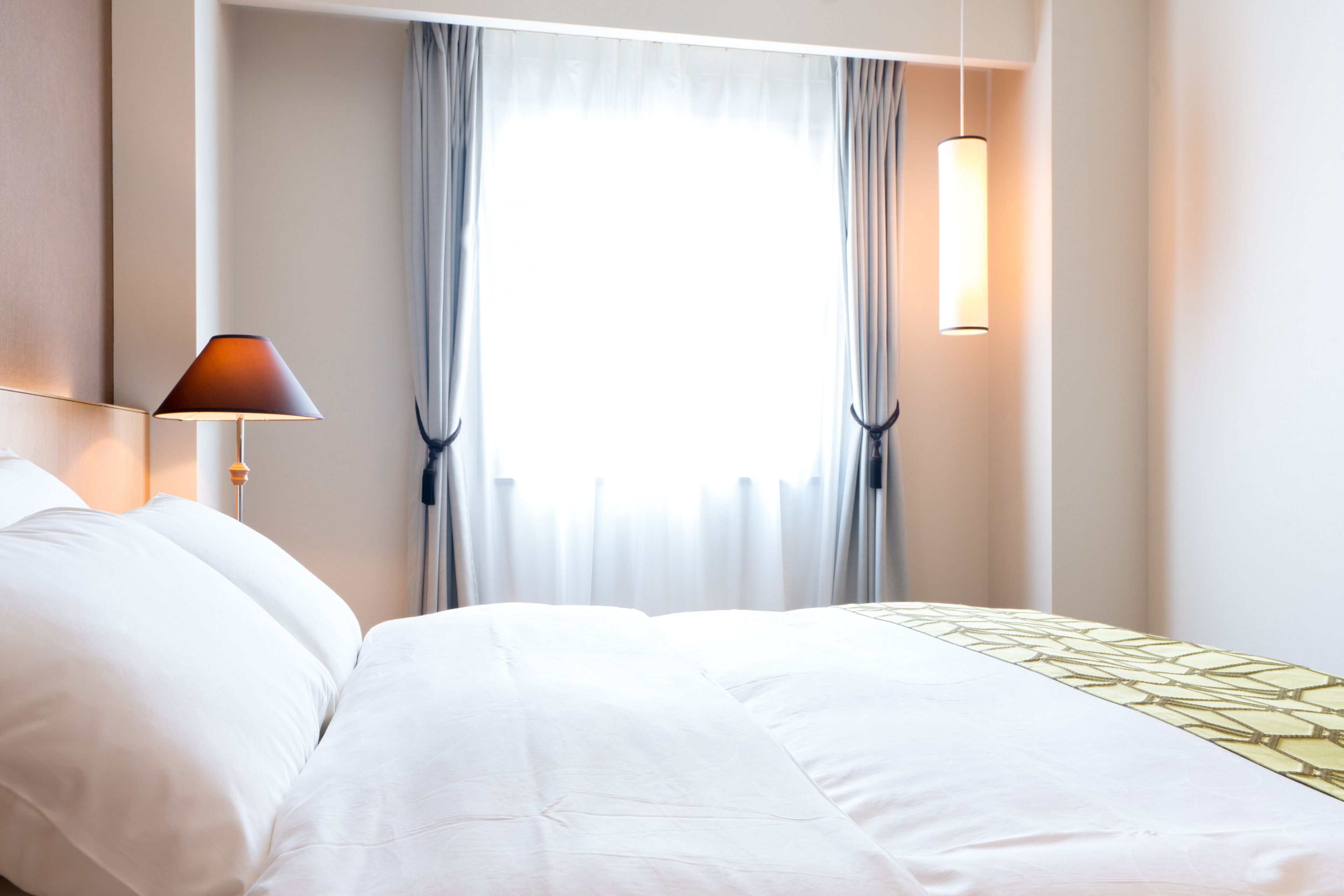 deluxe double room | down duvets, desk, blackout curtains, iron/ironing board