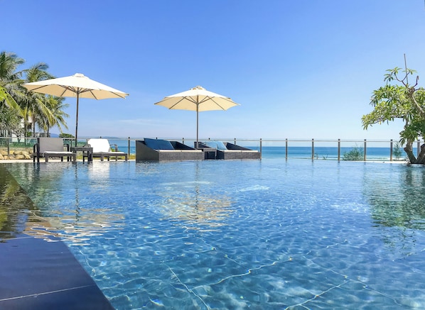 2 outdoor pools, open 6:00 AM to 6:00 PM, pool umbrellas, sun loungers